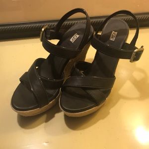 Women’s UGG wedge dark brown sandal.
